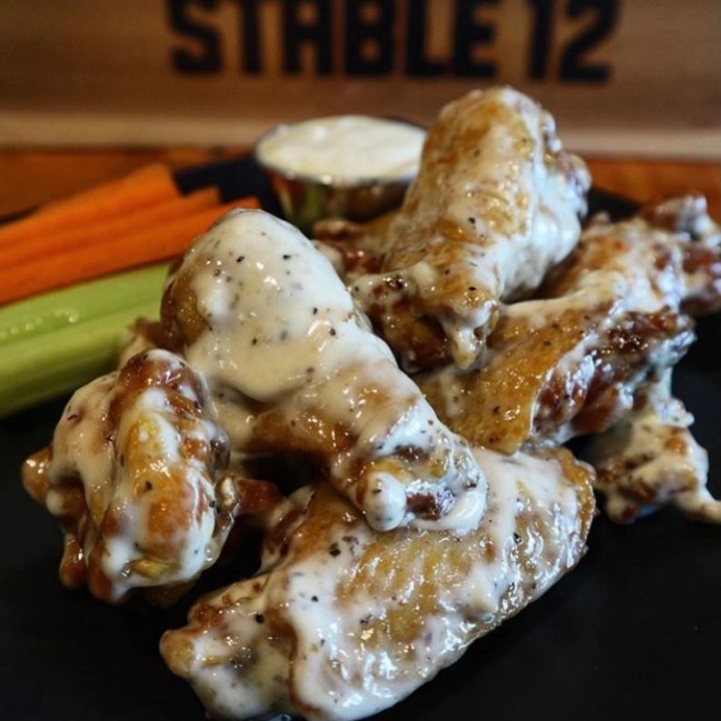 Tonight, all wing variations are half off *when you make a beer purchase