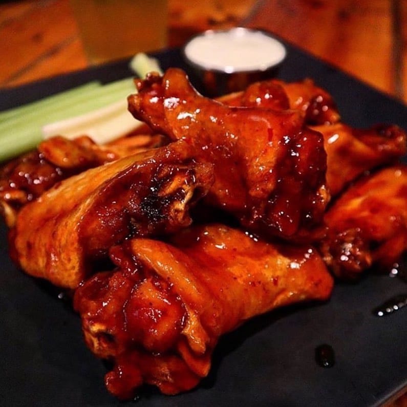 Tonight, all wing variations are half off *when you make a beer purchase