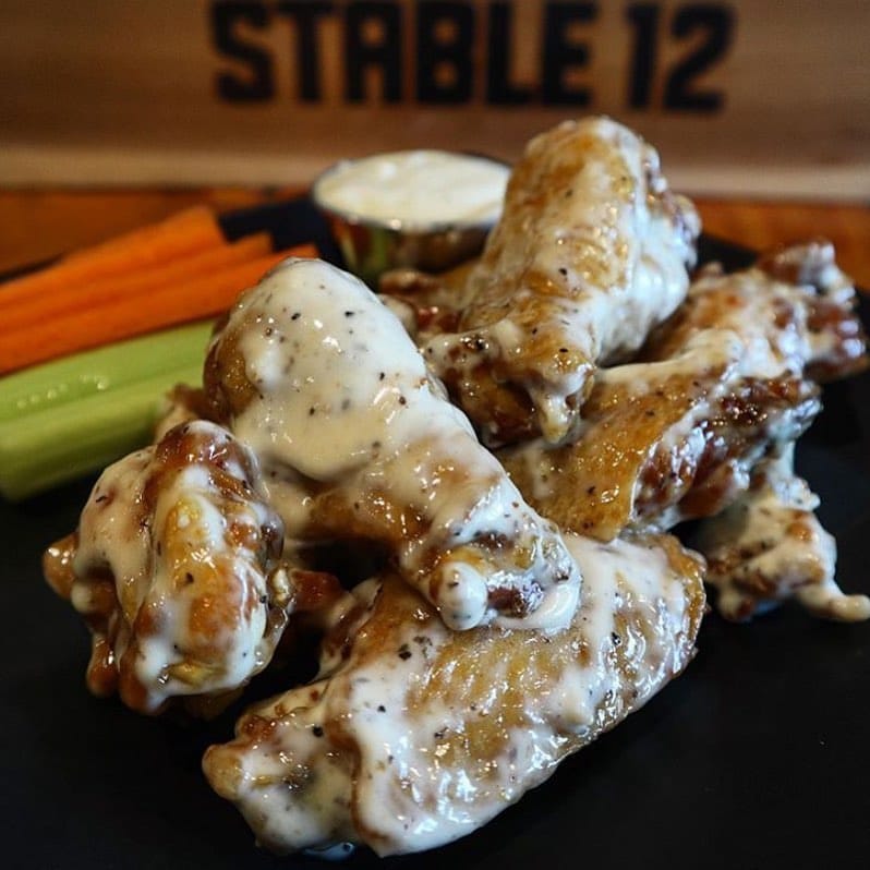 Tonight, all wing variations are half off *when you make a beer purchase*