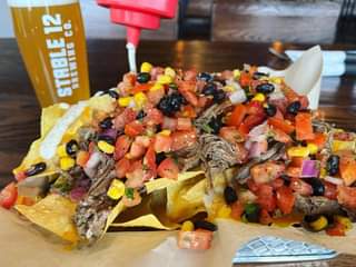 Sundays are for nachos with your favorite people 🍻 Open 12-8!